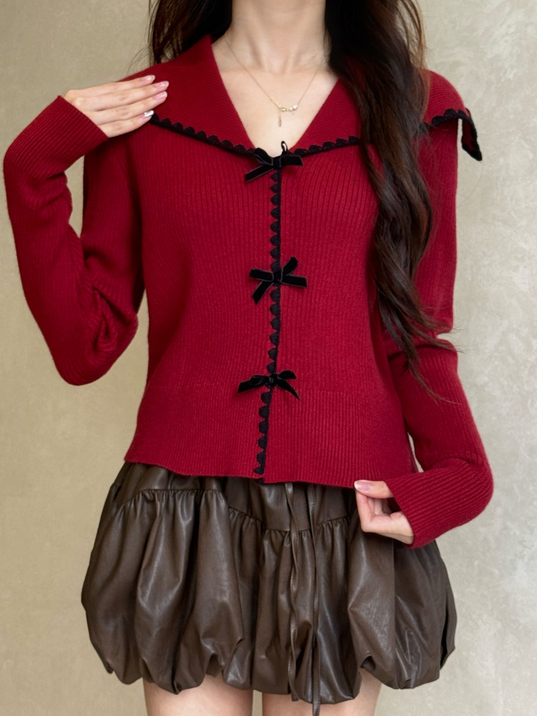 甜美丝绒蝴蝶结千金毛衣